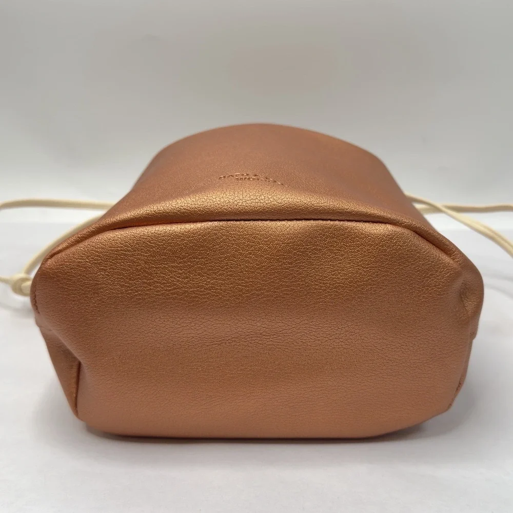 Bath Body Bath metallic penny copper color with Tan Drawstring Bag
